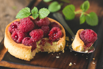 Cake with fresh raspberries and mint