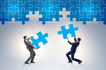 Concept of businessman with missing jigsaw puzzle piece