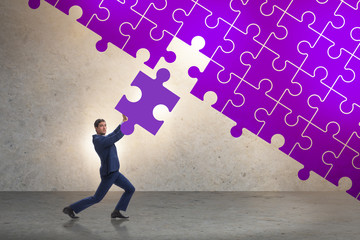 Concept of businessman with missing jigsaw puzzle piece