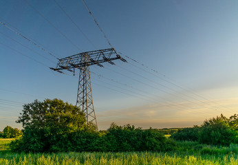 electricity pylons in field