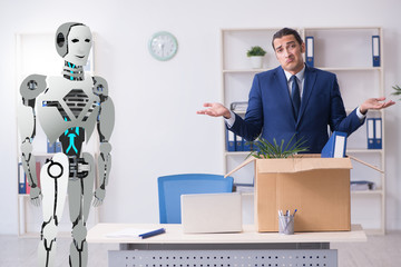 Concept of robots replacing humans in offices