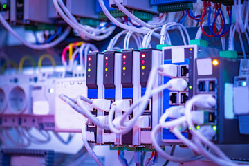Wires connected to power supply. The source of electrical power. Connected cables. Support of power supply. Ensuring the supply of current. Electroavtomatica. Electrical engineering.
