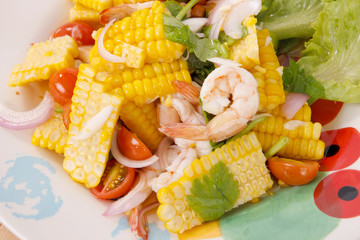 Hot and spicy sour Thai Salads. With Prawn and Chopped Corn. Close up