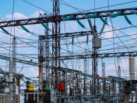 Transformer substation. High voltage wires. Ceramic insulators. Industrial landscape