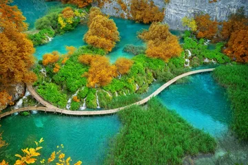Peel and stick wall murals Green Beautiful wooden path trail for nature trekking with lakes and waterfall landscape in Plitvice Lakes National Park, UNESCO natural world heritage and famous travel destination of Croatia.