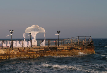 Wedding gazebo on sea pier