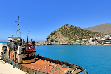The rusty wreck of two vessels in agia Galini in Crete, Greece