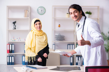 Female arab patient visiting male doctor 