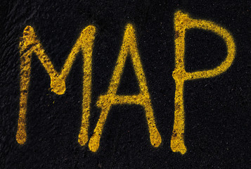 Roadmap block letters on asphalt ground