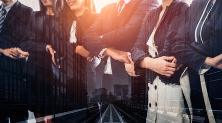 Teamwork and Business Human Resources - Group of business people working together as successful...
