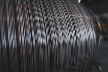 Pile of iron, metal wire rod or coil background for Construction industry. steel wire fence rolls....