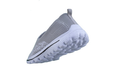 Sneaker gray on a white sole. Sport shoes on a white background.