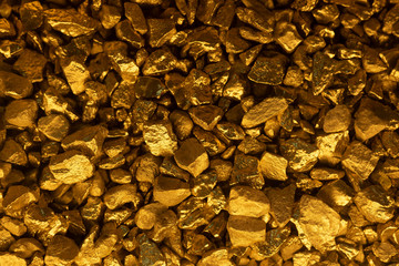 Gold. Gold stones. Background of gold stones.