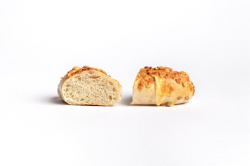 Freshly baked bread rolls isolated on white background.