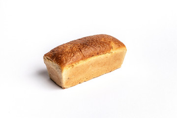 Fresh home-made bread with a crispy crust, on white background.