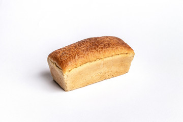 Fresh home-made bread with a crispy crust, on white background.