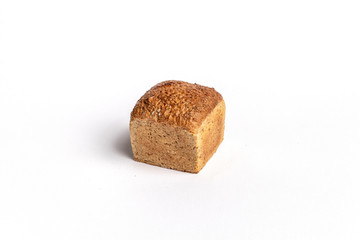 Fresh home-made bread with a crispy crust, on white background.
