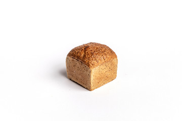 Fresh home-made bread with a crispy crust, on white background.