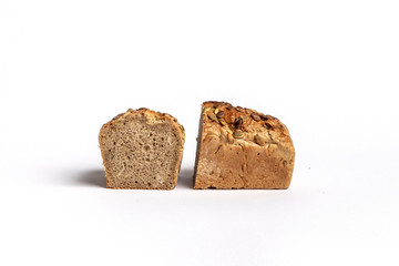 Fresh home-made bread with a crispy crust, on white background.