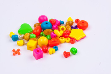 Colourful beads - white background.