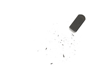 eraser scrap and black eraser on white background.