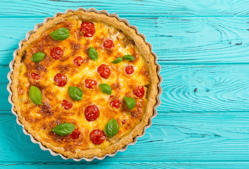 Chicken Quiche lorraine with mushrooms , tomatoes and cheese