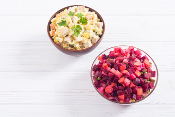 Traditional Russian salad olivier andvinaigrette