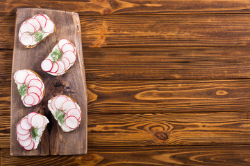 Healthy vegetable toasts sandwith with radish and dill