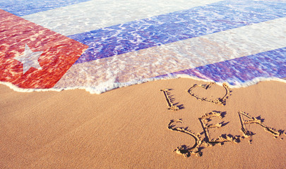 Beach sand, sea and flag Cuba. I love Cuba concept