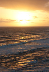 The sunset over the sea at the Twelve Apostles on the Great Ocean Road in Australia