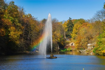 Nice autumn panorama of Sofiyivka Park lake Ukraine Uman rainbow nature gold water