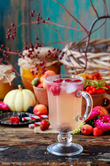 Homemade fruit lemonade with icecubes.