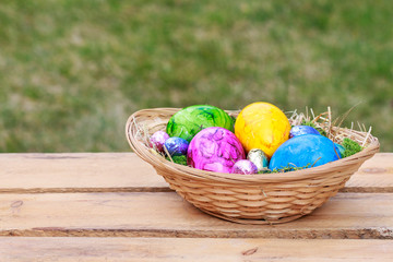 Basket with colorful Easter eggs.