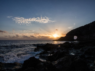 sunrise at the elephant arch of the island of Pantelleria, Italy