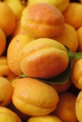 Naklejka na ściany i meble apricots on wooden background