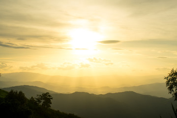 The longitudinal mountains and the setting sun and the forest on Doi Tung