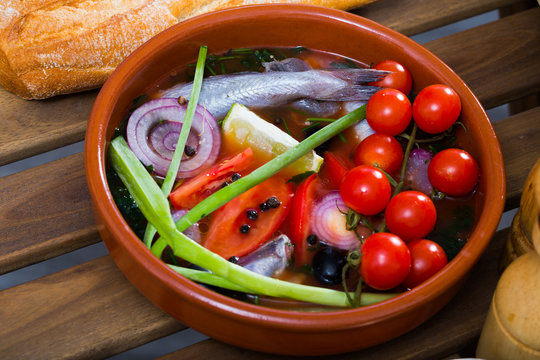 Fisherman's broth prepared with poutassou and small sea fish