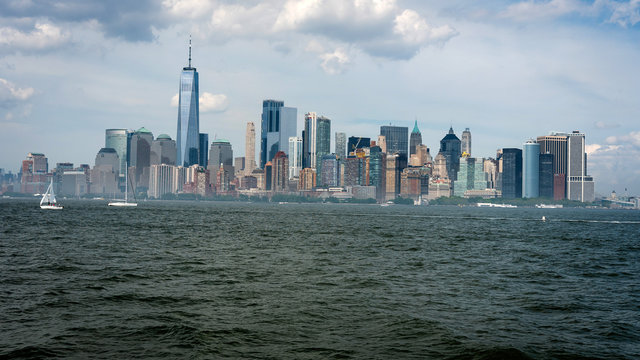 Skyline and modern office buildings of Midtown Manhattan viewed from across the Hudson River. - Image