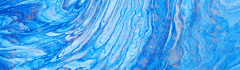 photography of abstract marbleized effect background. Blue and white creative colors. Beautiful paint. banner