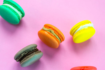 Close-up shot of colored macaroons in different position