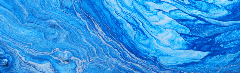 photography of abstract marbleized effect background. Blue and white creative colors. Beautiful...