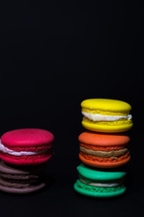 Close-up shot of colored macaroons in different position