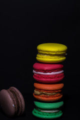 Close-up shot of colored macaroons in different position