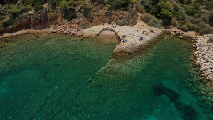 Fototapeta na wymiar Aerial drone photo of rocky peninsula in Astir area or Asteras, Vouliagmenis, Attica, Greece