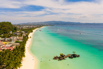 White beach on the island of Boracay, Philippines, top view. White sandy beach and turquoise sea...