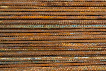 Top view stack of straight old rusty high yield stress deformed reinforcement steel or iron bars....