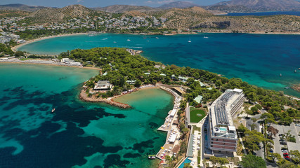 Aerial drone photo of rocky seascape in Vouliagmeni peninsula, Athens riviera, Attica, Greece