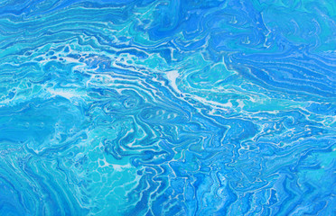 photography of abstract marbleized effect background. Blue and white creative colors. Beautiful paint.