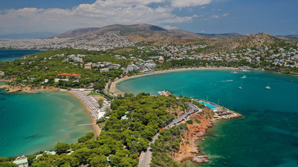 Aerial drone photo of rocky seascape in Vouliagmeni peninsula, Athens riviera, Attica, Greece