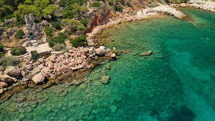 Aerial drone photo of rocky seascape in Vouliagmeni peninsula, Athens riviera, Attica, Greece